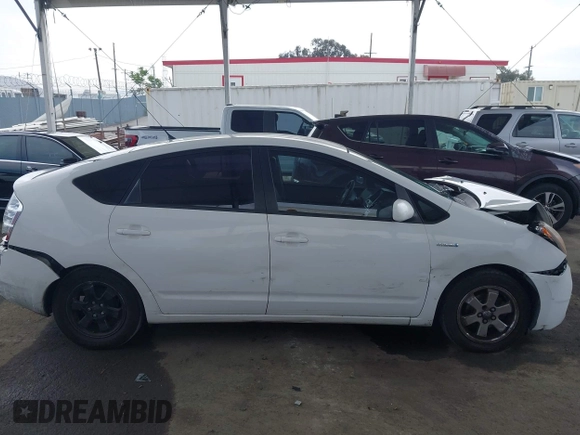 2008 Toyota Prius z VIN JTDKB20U483454957, wystawiony jako IAAI lot #42358477 z przebiegiem 256 781 mil mil oraz . Historia ofert i sprzedaży dostępna na DreamBid. Obrazek 14.