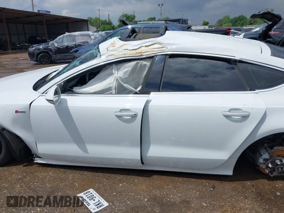 2014 Audi A7 Prestige z VIN WAU2GAFC7EN126780, wystawiony jako IAAI lot #42095865 z przebiegiem Nie podano mil oraz . Historia ofert i sprzedaży dostępna na DreamBid. Obrazek 14.