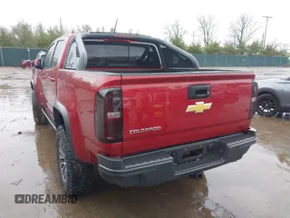 2018 Chevrolet Colorado 4WD ZR2 with VIN 1GCPTEE16J1138755, listed as a IAAI auction lot 41215626 with 118,661 mi miles. Bid and sale history available at carsss.com. Image 3.