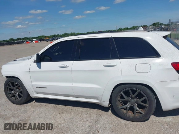 2020 Jeep Grand Cherokee Trackhawk with VIN 1C4RJFN96LC141513, listed as a IAAI auction lot 42386219 with Not provided miles and . Bid and sale history available at DreamBid. Image 14.