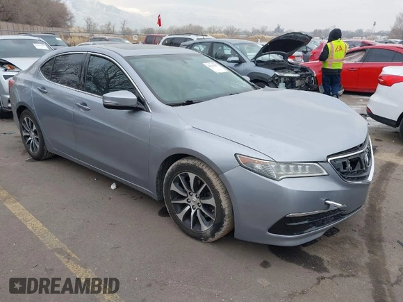 2015 Acura TLX with VIN 19UUB1F3XFA006489, listed as a IAAI auction lot 41352507 with 121,710 mi miles. Bid and sale history available at carsss.com. Image 1.