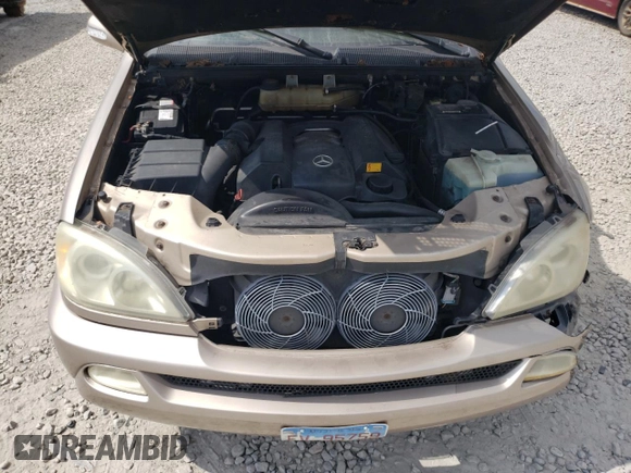 2002 Mercedes-Benz M-Class with VIN 4JGAB54E72A322046, listed as a Copart auction lot 74393084 with 128,015 mi miles and Salvage Title. Bid and sale history available at carsss.com. Image 12.
