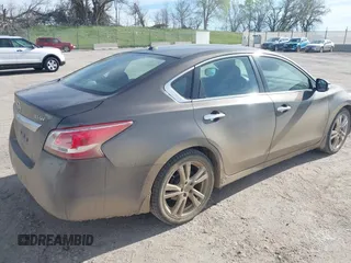 2013 Nissan Altima SV z VIN 1N4BL3AP4DN567890, wystawiony jako IAAI lot #42128612 z przebiegiem 169 491 mil mil oraz . Historia ofert i sprzedaży dostępna na DreamBid. Obrazek 4.