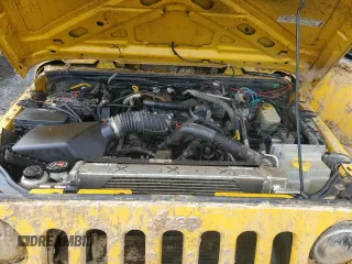 2009 Jeep Wrangler X with VIN 1J4FA24119L754391, listed as a Copart auction lot 56067805 with 118,117 mi miles and Salvage title. Bid and sale history available at DreamBid. Image 12.
