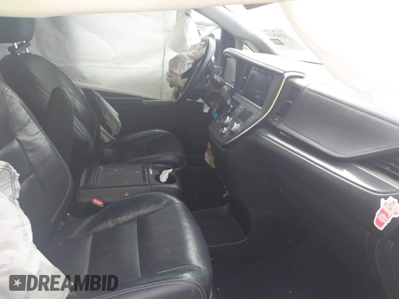 2015 Toyota Sienna SE с VIN 5TDXK3DC7FS599287, выставлен на аукционе IAAI как лот 41565671 с пробегом 111 626 миль миль и . История ставок и продаж доступна на DreamBid. Изображение 5.