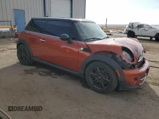 2011 MINI Hardtop with VIN WMWSU3C58BT253815, listed as a Copart auction lot 51544835 with 115,515 mi miles and Salvage Title. Bid and sale history available at DreamBid. Image 4.