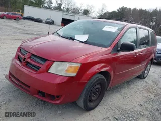 2010 Dodge Grand Caravan SE with VIN 2D4RN4DE7AR138618, listed as a IAAI auction lot 41812857 with 208,533 mi miles. Bid and sale history available at carsss.com. Image 2.