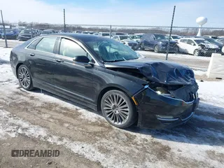 2014 Lincoln MKZ z VIN 3LN6L2GKXER809691, wystawiony jako IAAI lot #41588488 z przebiegiem 163 552 mil mil oraz . Historia ofert i sprzedaży dostępna na DreamBid. Obrazek 1.