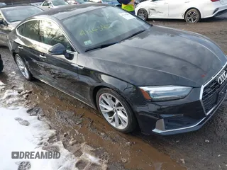 2021 Audi A5 Sportback Premium with VIN WAUABCF57MA017796, listed as a IAAI auction lot 41443407 with 54,839 mi miles. Bid and sale history available at carsss.com. Image 1.
