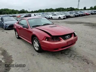 2002 Ford Mustang Standard z VIN 1FAFP40412F107189, wystawiony jako Copart lot #58425645 z przebiegiem 148 551 mil mil oraz Szkoda całkowita • Salvage title. Historia ofert i sprzedaży dostępna na DreamBid. Obrazek 13.