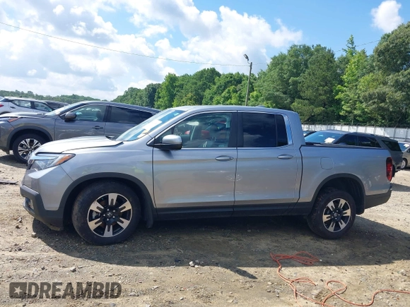2020 Honda Ridgeline RTL with VIN 5FPYK3F5XLB025857, listed as a IAAI auction lot 42307343 with 97,262 mi miles and . Bid and sale history available at DreamBid. Image 14.