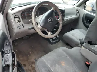 2003 Mazda B-Series Truck DS z VIN 4F4YR16V03TM05710, wystawiony jako Copart lot #54114605 z przebiegiem 187 857 mil mil oraz Szkoda całkowita • Salvage title. Historia ofert i sprzedaży dostępna na DreamBid. Obrazek 8.