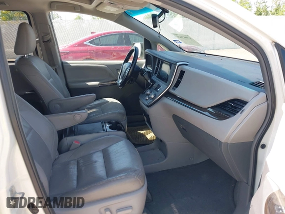 2015 Toyota Sienna XLE with VIN 5TDYK3DCXFS663083, listed as a IAAI auction lot 41967621 with 177,472 mi miles and . Bid and sale history available at DreamBid. Image 5.