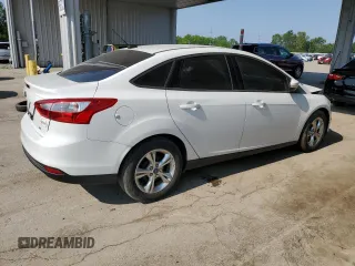 2013 Ford Focus SE with VIN 1FADP3F21DL315133, listed as a Copart auction lot 60502705 with 123,504 mi miles and Salvage title. Bid and sale history available at DreamBid. Image 3.