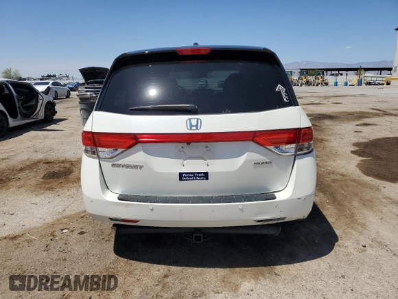 2015 Honda Odyssey Touring Elite z VIN 5FNRL5H91FB053430, wystawiony jako Copart lot #55276315 z przebiegiem 96 667 mil mil oraz Szkoda całkowita • Salvage title. Historia ofert i sprzedaży dostępna na DreamBid. Obrazek 6.