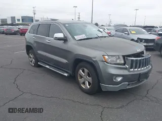 2013 Jeep Grand Cherokee Limited with VIN 1C4RJEBTXDC539433, listed as a IAAI auction lot 42046724 with 266,913 mi miles. Bid and sale history available at carsss.com. Image 1.