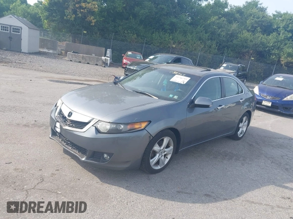 2009 Acura TSX with VIN JH4CU26689C035369, listed as a IAAI auction lot 39746793 with 194,320 mi miles and . Bid and sale history available at DreamBid. Image 2.