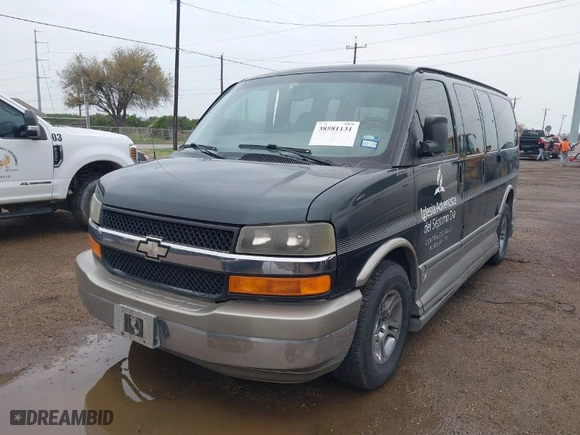 2003 Chevrolet Express Cargo Van YF7 Upfitter with VIN 1GBFG15T431237706, listed as a IAAI auction lot 38581131 with 198,566 mi miles. Bid and sale history available at carsss.com. Image 2.
