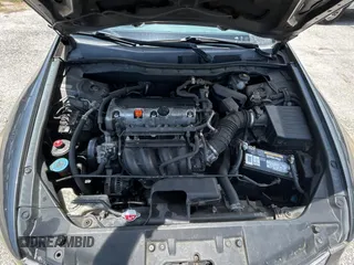 2009 Honda Accord LX-P with VIN 1HGCP26419A165093, listed as a Copart auction lot 61976585 with 172,398 mi miles and Clean title. Bid and sale history available at DreamBid. Image 7.