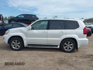 2004 Lexus GX 470 with VIN JTJBT20X440062559, listed as a IAAI auction lot 42142442 with 261,126 mi miles. Bid and sale history available at carsss.com. Image 14.