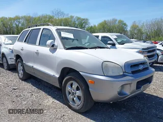 2005 Hyundai Santa Fe GLS with VIN KM8SC13D95U888747, listed as a IAAI auction lot 38833174 with 154,111 mi miles. Bid and sale history available at carsss.com. Image 1.