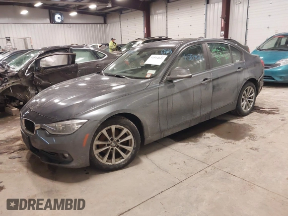 2018 BMW 3 Series 320i xDrive with VIN WBA8E5G50JNU48047, listed as a IAAI auction lot 41564022 with 69,971 mi miles. Bid and sale history available at carsss.com. Image 2.