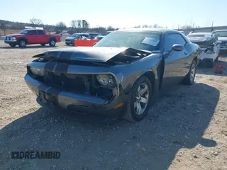2011 Dodge Challenger z VIN 2B3CJ4DG3BH512974, wystawiony jako IAAI lot #41431931 z przebiegiem 186 845 mil mil oraz . Historia ofert i sprzedaży dostępna na DreamBid. Obrazek 17.
