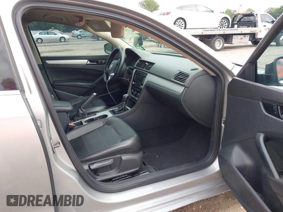 2013 Volkswagen Passat SE with VIN 1VWBP7A30DC098440, listed as a IAAI auction lot 42722686 with 305,716 mi miles and . Bid and sale history available at DreamBid. Image 5.