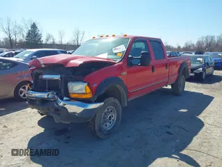1999 Ford Super Duty F-250 XL with VIN 1FTNW21S5XED28172, listed as a IAAI auction lot 41887957 with 233,990 mi miles. Bid and sale history available at carsss.com. Image 2.