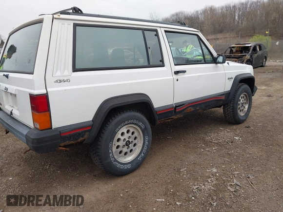 1996 Jeep Cherokee Sport with VIN 1J4FJ67S4TL224743, listed as a IAAI auction lot 42083533 with 253,847 mi miles. Bid and sale history available at carsss.com. Image 4.