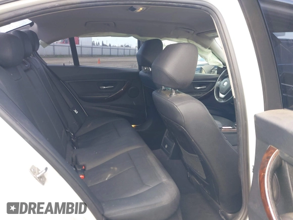 2015 BMW 3 Series 328i with VIN WBA3C1C5XFK117788, listed as a IAAI auction lot 41752178 with 154,030 mi miles and . Bid and sale history available at carsss.com. Image 8.