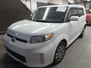 2014 Scion xB with VIN JTLZE4FE1EJ060281, listed as a IAAI auction lot 41477386 with 61,423 mi miles. Bid and sale history available at carsss.com. Image 17.
