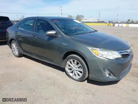 2012 Toyota Camry Hybrid XLE with VIN 4T1BD1FK0CU020723, listed as a IAAI auction lot 42031093 with 121,297 mi miles. Bid and sale history available at carsss.com. Image 1.