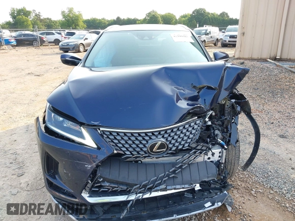 2022 Lexus RX 350 with VIN 2T2HZMAA5NC232352, listed as a IAAI auction lot 42399381 with 13,359 mi miles and . Bid and sale history available at DreamBid. Image 12.