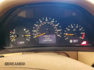 2002 Mercedes-Benz E-Class with VIN WDBJF65J12B485293, listed as a Copart auction lot 77561984 with 140,708 mi miles and Salvage Title. Bid and sale history available at carsss.com. Image 9.