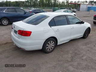 2014 Volkswagen Jetta S with VIN 3VW2K7AJ3EM294563, listed as a IAAI auction lot 42584163 with 149,769 mi miles and . Bid and sale history available at DreamBid. Image 4.