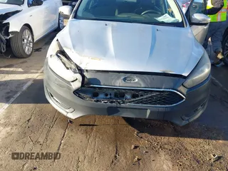 2017 Ford Focus SEL with VIN 1FADP3H21HL336597, listed as a IAAI auction lot 41729173 with 166,140 mi miles. Bid and sale history available at carsss.com. Image 6.