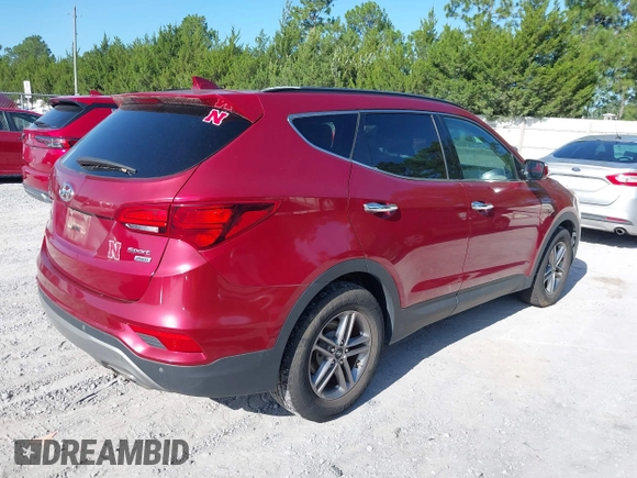 2017 Hyundai Santa Fe 2.4L with VIN 5XYZUDLBXHG397691, listed as a IAAI auction lot 42687035 with 115,563 mi miles and . Bid and sale history available at DreamBid. Image 4.