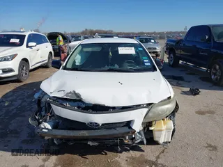2009 Toyota Corolla with VIN 1NXBU40EX9Z020788, listed as a IAAI auction lot 41760498 with 188,780 mi miles. Bid and sale history available at carsss.com. Image 12.