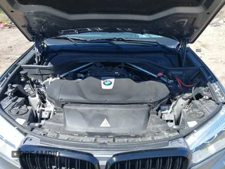 2014 BMW X5 xDrive50i with VIN 5UXKR6C57E0J72301, listed as a IAAI auction lot 39379887 with 117,012 mi miles. Bid and sale history available at carsss.com. Image 10.