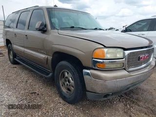2003 GMC Yukon XL SLT z VIN 1GKEC16Z23J232918, wystawiony jako IAAI lot #42393646 z przebiegiem Nie podano mil oraz . Historia ofert i sprzedaży dostępna na DreamBid. Obrazek 1.