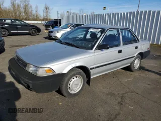 1990 Toyota Corolla z VIN JT2AE94A1L3375095, wystawiony jako Copart lot #41892305 z przebiegiem 182 429 mil mil oraz Czysty tytuł • Clean title. Historia ofert i sprzedaży dostępna na DreamBid. Obrazek 1.