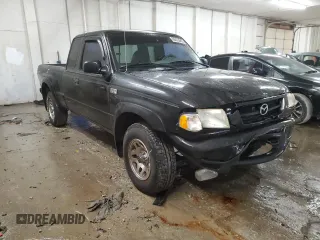 2001 Mazda B-Series 2WD Truck DS with VIN 4F4YR16V41TM25326, listed as a Copart auction lot 88433645 with 207,857 mi miles and Salvage Title. Bid and sale history available at carsss.com. Image 4.