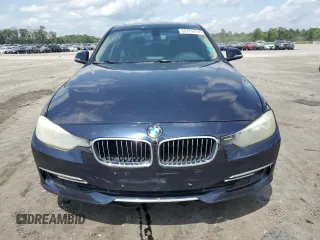 2012 BMW 3 Series 328i with VIN WBA3A5C52CF257206, listed as a Copart auction lot 62765794 with 147,995 mi miles and Salvage Title. Bid and sale history available at carsss.com. Image 5.