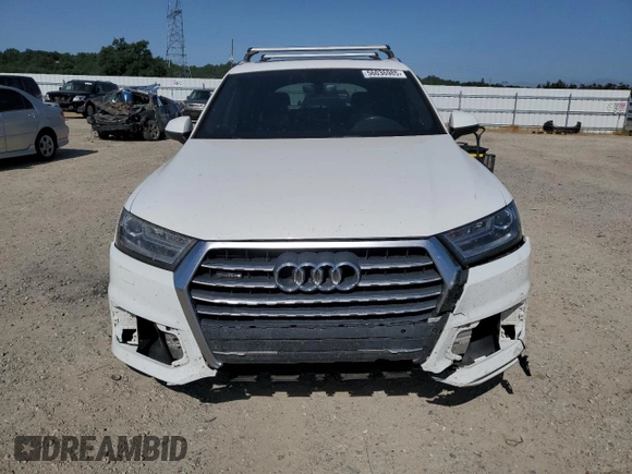 2017 Audi Q7 Premium with VIN WA1AAAF74HD025817, listed as a Copart auction lot 56036985 with 130,410 mi miles and Salvage title. Bid and sale history available at DreamBid. Image 5.