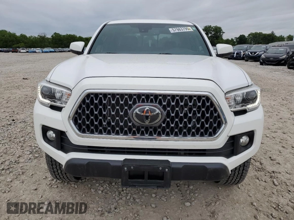 2019 Toyota Tacoma SR z VIN 3TMCZ5AN1KM190613, wystawiony jako Copart lot #57983795 z przebiegiem 41 627 mil mil oraz Szkoda całkowita • Salvage title. Historia ofert i sprzedaży dostępna na DreamBid. Obrazek 5.
