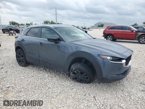 2023 Mazda CX-30 S Carbon Edition z VIN 3MVDMBCM2PM539130, wystawiony jako Copart lot #54817735 z przebiegiem 29 678 mil mil oraz Szkoda całkowita • Salvage title. Historia ofert i sprzedaży dostępna na DreamBid. Obrazek 4.