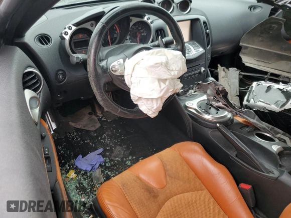 2014 Nissan 370Z Nismo z VIN JN1AZ4EH0EM634461, wystawiony jako Copart lot #53375685 z przebiegiem 171 858 mil mil oraz Szkoda całkowita • Salvage title. Historia ofert i sprzedaży dostępna na DreamBid. Obrazek 8.