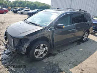 2013 Honda Odyssey Touring with VIN 5FNRL5H93DB017932, listed as a Copart auction lot 60112165 with 110,761 mi miles and Salvage title. Bid and sale history available at DreamBid. Image 1.