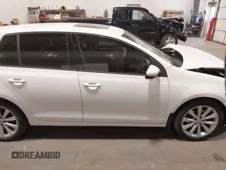 2012 Volkswagen Golf TDI z VIN WVWDM7AJ9CW296921, wystawiony jako IAAI lot #42070028 z przebiegiem 113 511 mil mil oraz . Historia ofert i sprzedaży dostępna na DreamBid. Obrazek 14.